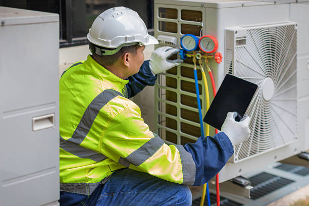 Professional Ac Installation technician working in Russellville, AL